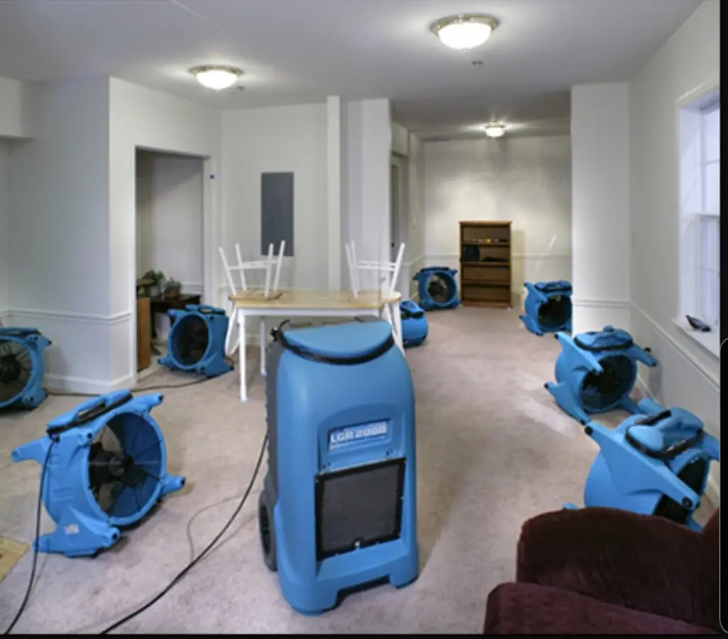 Air movers and dehumidifier setup for Water Damage Restoration in Holliston